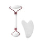 White marble facial roller and gua sha tool for skincare and beauty routine