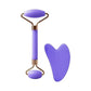 Purple facial roller and gua sha tool for skincare and beauty routines