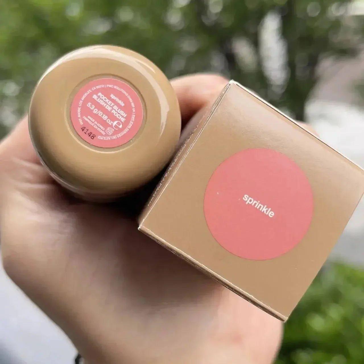 Sprinkle Pocket Blush compact and box held in hand, natural makeup for women's fashion beauty