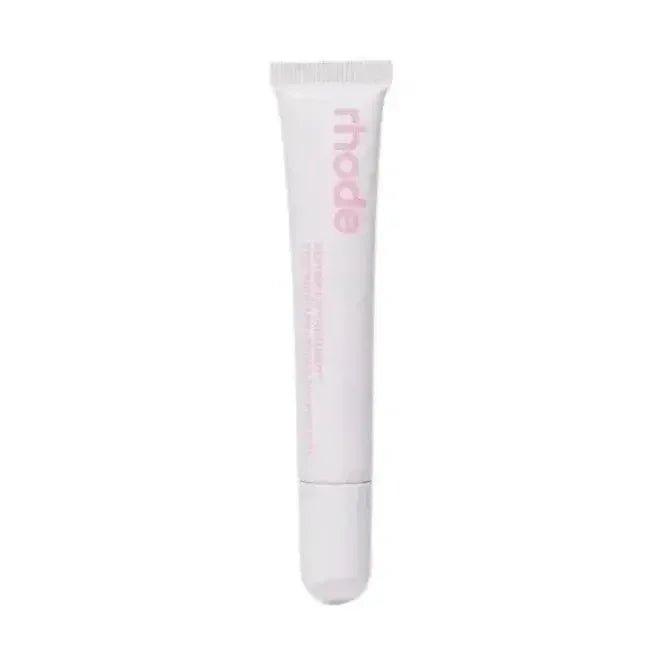 Rhode lip treatment tube, pink text on white packaging, beauty skincare product