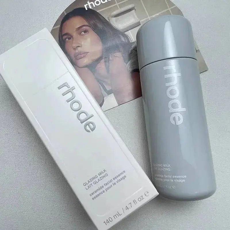 Rhode Glazing Milk ceramide facial essence in sleek gray bottle and white box, beauty skincare product