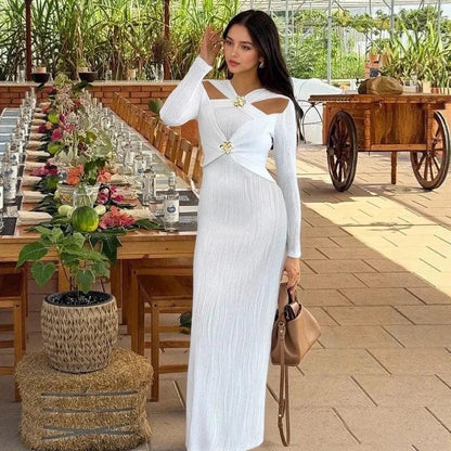 Elegant white long-sleeve maxi dress with cutout shoulders, perfect for women's fashion events and garden parties.