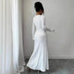 White long-sleeve pleated maxi dress for women, elegant fashion outfit with high heels