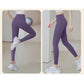 Purple high-waist workout leggings for women, perfect for yoga and fitness, paired with white sneakers.