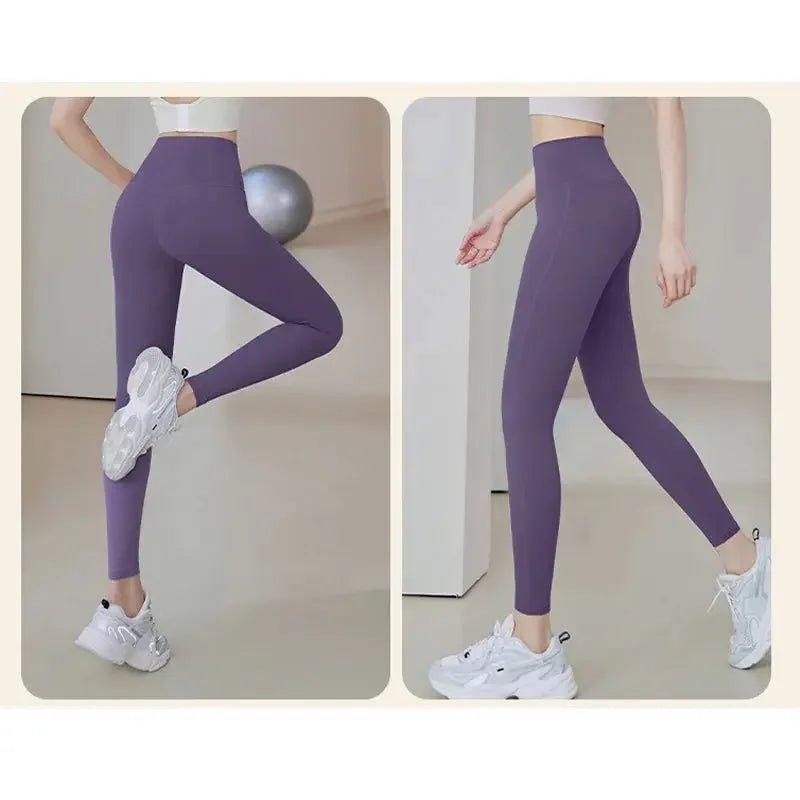 Purple high-waist workout leggings for women, perfect for yoga and fitness, paired with white sneakers.