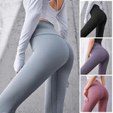Women's high-waisted yoga leggings in gray, black, purple, pink — stretchy fitness wear for workouts