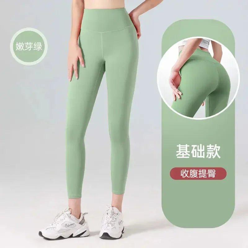Women's mint green high-waist leggings, tummy control & butt lift, fitness wear with white sneakers