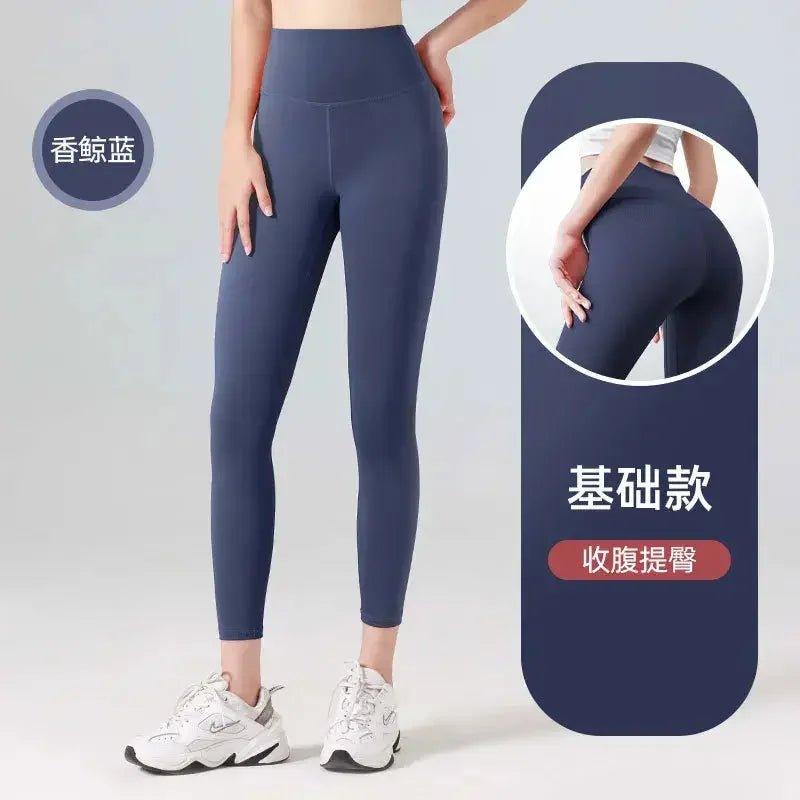 Women's high-waist navy blue leggings, tummy control & butt lift, fitness wear with white sneakers