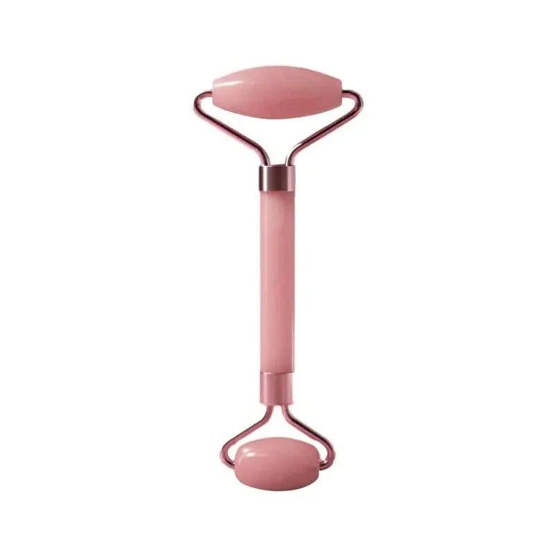 Pink dual-ended facial roller for skincare and beauty routines