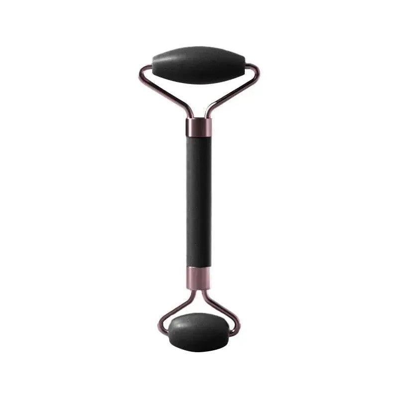 Dual-ended facial roller with black stone heads and rose gold handle for skincare massage