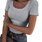 Gray ribbed women's scoop neck short sleeve top with jeans and belt, fashion outfit