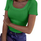 Green ribbed women's scoop neck t-shirt with short sleeves, paired with jeans and a belt for casual fashion
