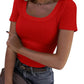 Red ribbed women's crop top with square neckline, paired with jeans and belt for casual fashion