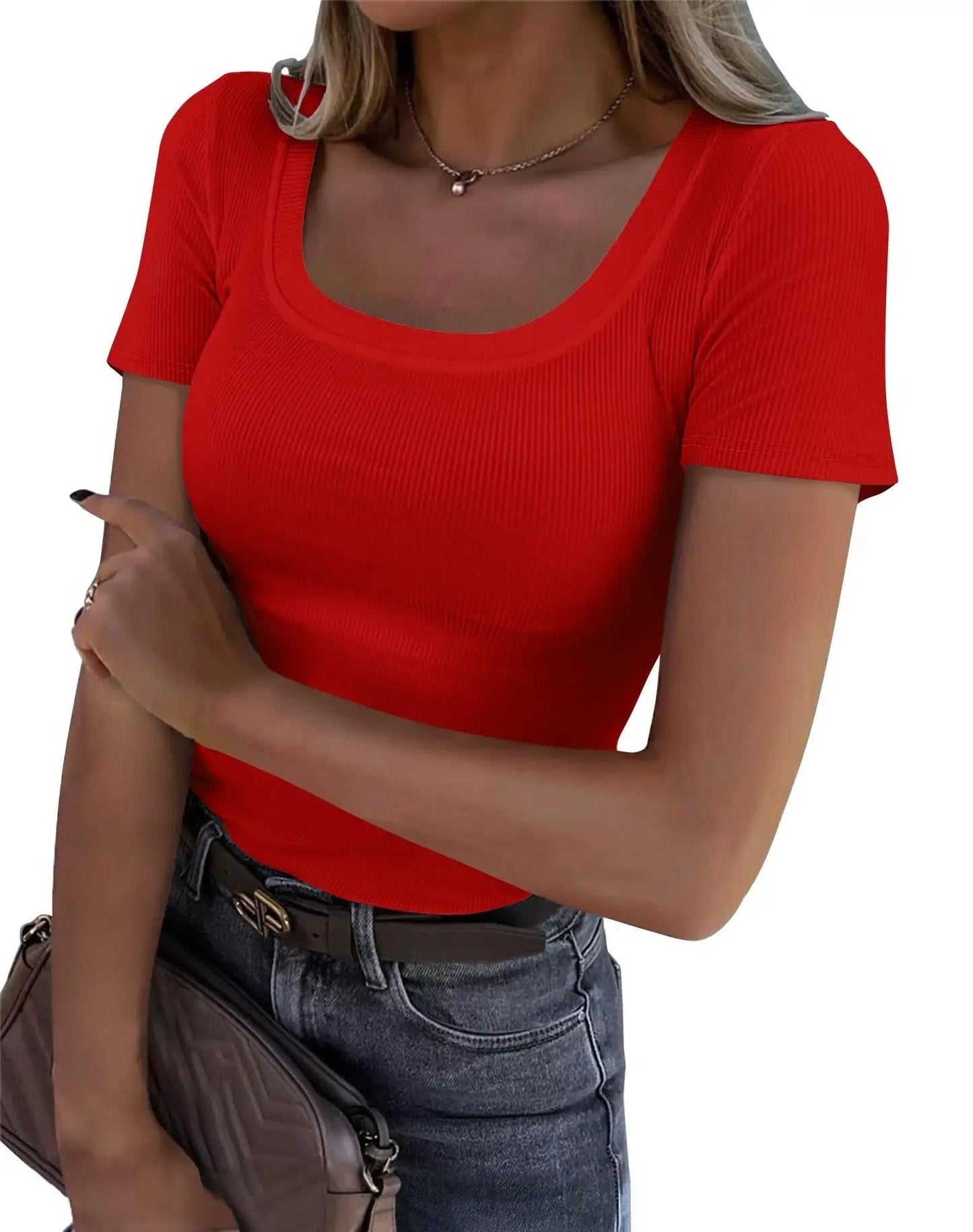 Red ribbed women's crop top with square neckline, paired with jeans and belt for casual fashion