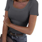 Gray ribbed women's scoop neck t-shirt with short sleeves, paired with jeans and a belt for casual fashion
