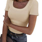 Beige ribbed women's square neck crop top with short sleeves, paired with jeans and a belt