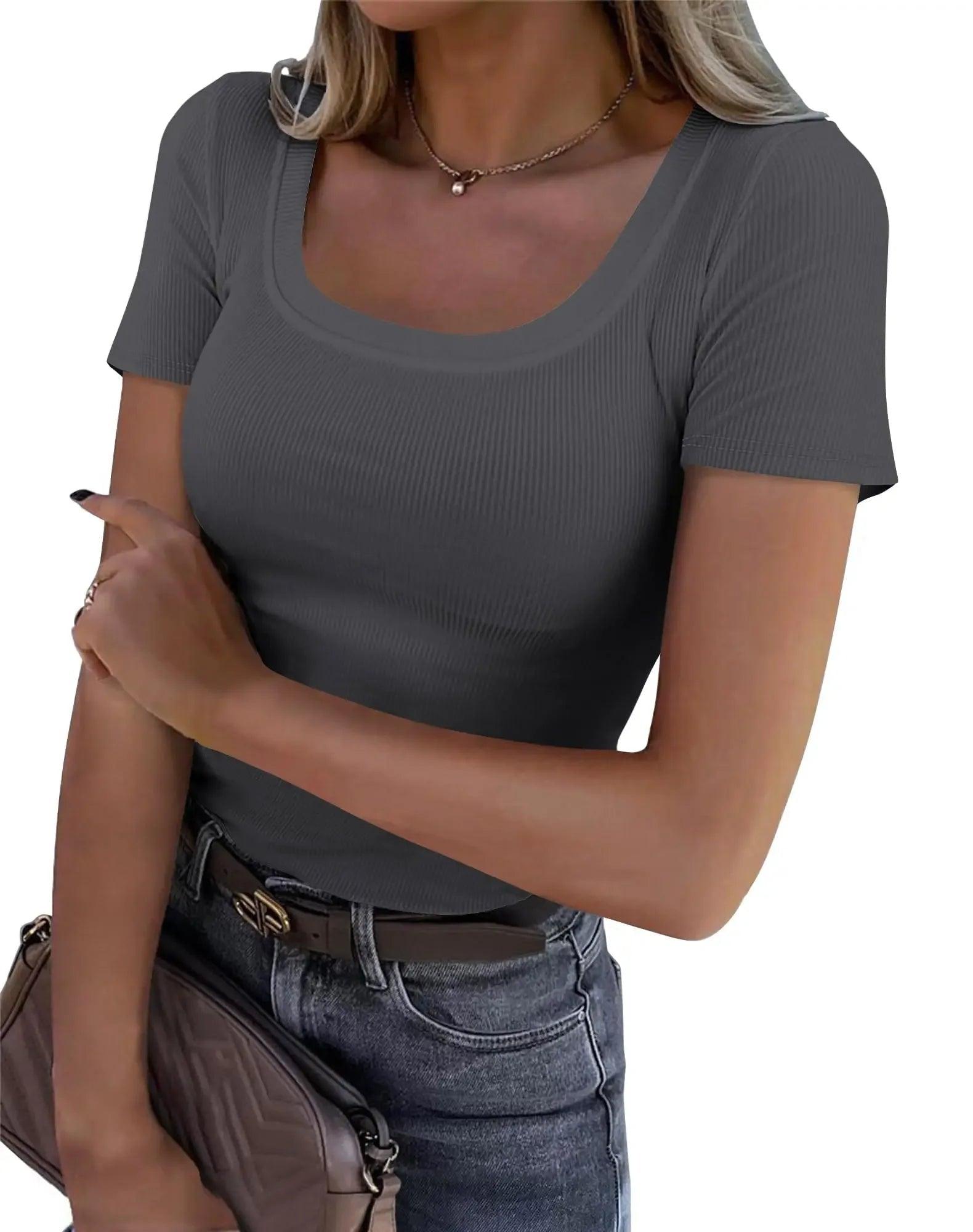 Gray ribbed women's scoop neck t-shirt with short sleeves, paired with jeans and a belt