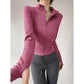 Pink zip-up athletic jacket with long sleeves, paired with gray leggings for women's fashion