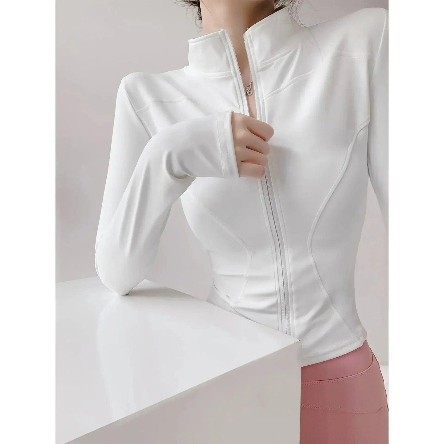White women's long sleeve zip-up athletic jacket for fitness and fashion