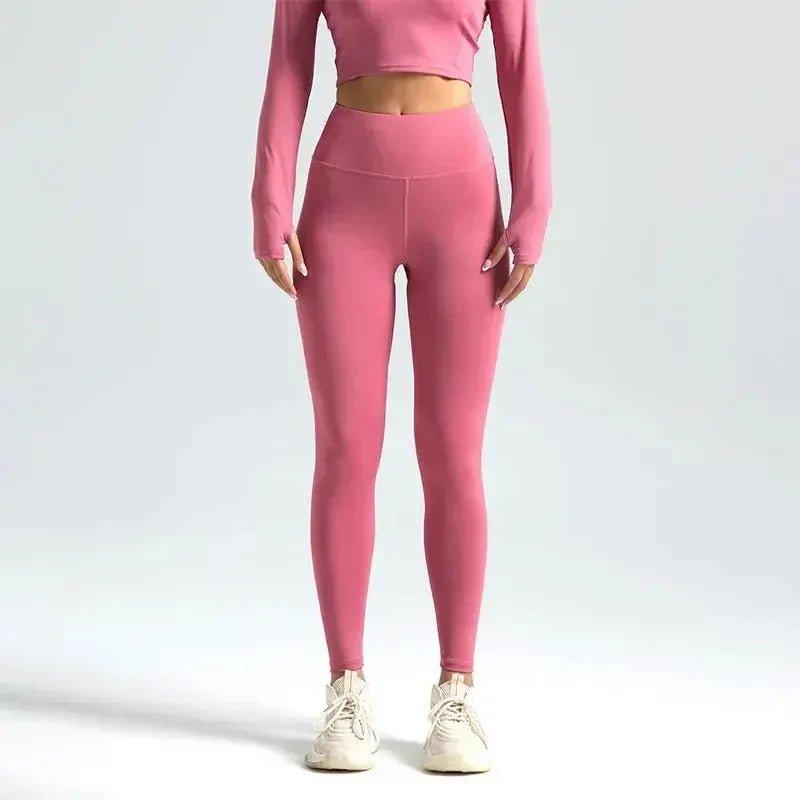 Pink high-waisted leggings with matching long sleeve crop top, women's fashion activewear set