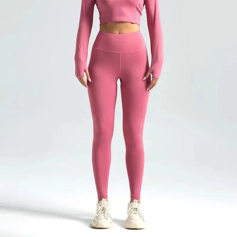 Pink high-waisted leggings with matching long sleeve crop top, women's fashion activewear set
