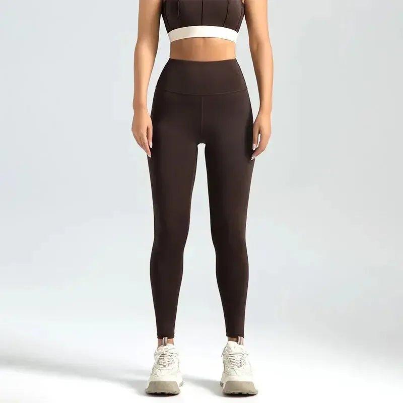 Brown high-waisted leggings with matching sports bra, ideal for women's fashion and fitness wear.