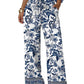 Blue floral print wide-leg pants with drawstring waist, paired with white crop top