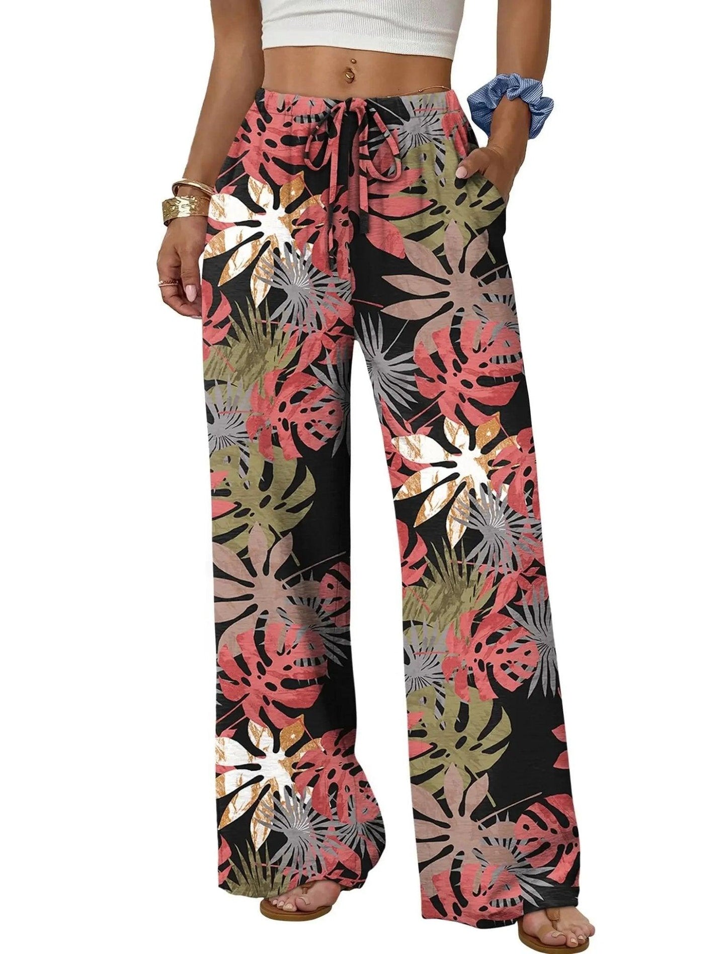 Tropical leaf print wide-leg pants for women, casual summer fashion with drawstring waist