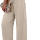Beige wide-leg drawstring pants with white crop top and boho clutch, women's fashion