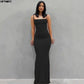 Black spaghetti strap maxi dress for women, elegant and form-fitting, perfect for fashion events