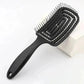 Black detangling hair brush with ergonomic handle for smooth styling