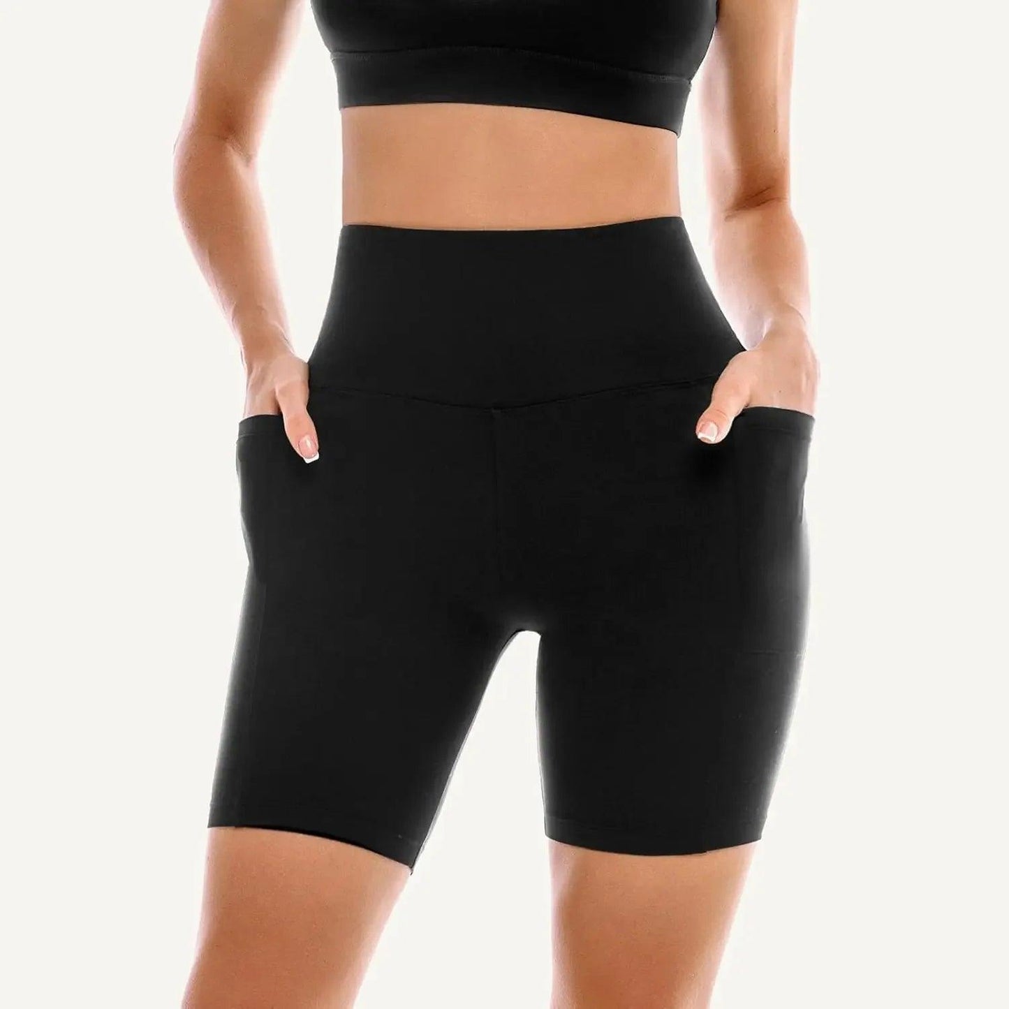 Black high-waisted biker shorts with pockets, women's activewear for gym or yoga
