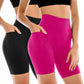 Women's high-waisted biker shorts in black and pink, featuring side pockets and seamless design for fitness and fashion.