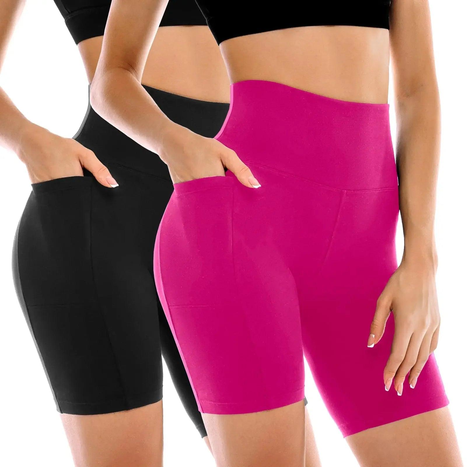 Women's high-waisted biker shorts in black and pink, featuring side pockets and seamless design for fitness and fashion.