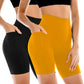 Women's high-waisted biker shorts in black and mustard yellow, featuring side pockets and seamless design for fitness or casual wear.