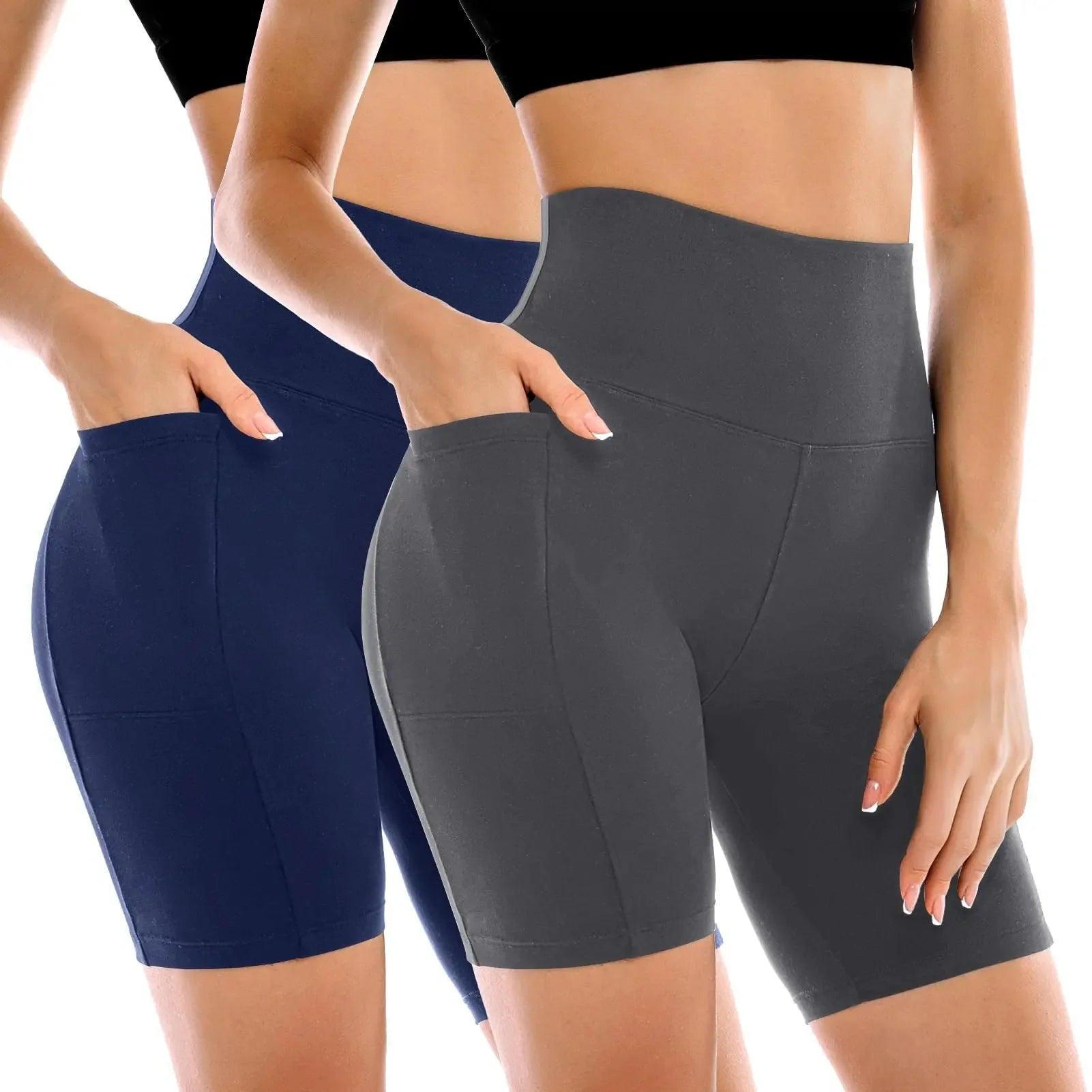 Women's high-waisted biker shorts with pockets in navy and gray, perfect for fitness and casual wear