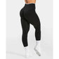 Black high-waisted leggings with white waistband, styled with white socks and sneakers for women's fashion