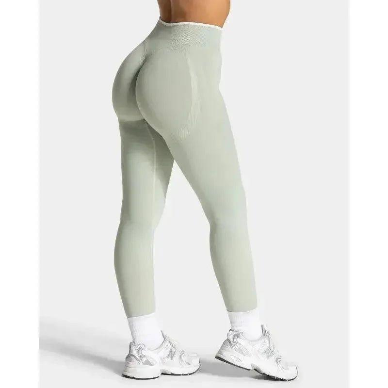 Women's high-waisted seamless leggings in light green, perfect for fitness and fashion