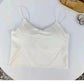 White women's satin camisole top with thin straps, stylish and elegant fashion wear