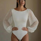 White bodysuit with sheer puff sleeves, elegant women's fashion