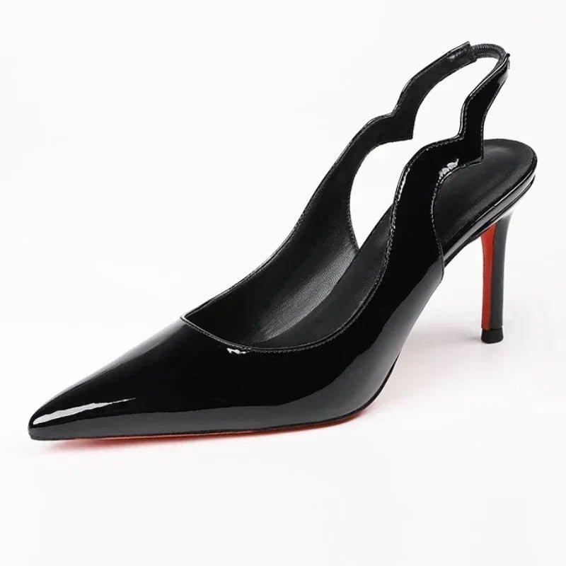 Black patent leather slingback heels with red sole, pointed toe, and stiletto heel for women's fashion