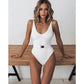 White ribbed one-piece swimsuit with belt, stylish women's beachwear fashion