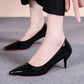 Black patent leather pointed toe heels with red soles, women's fashion footwear