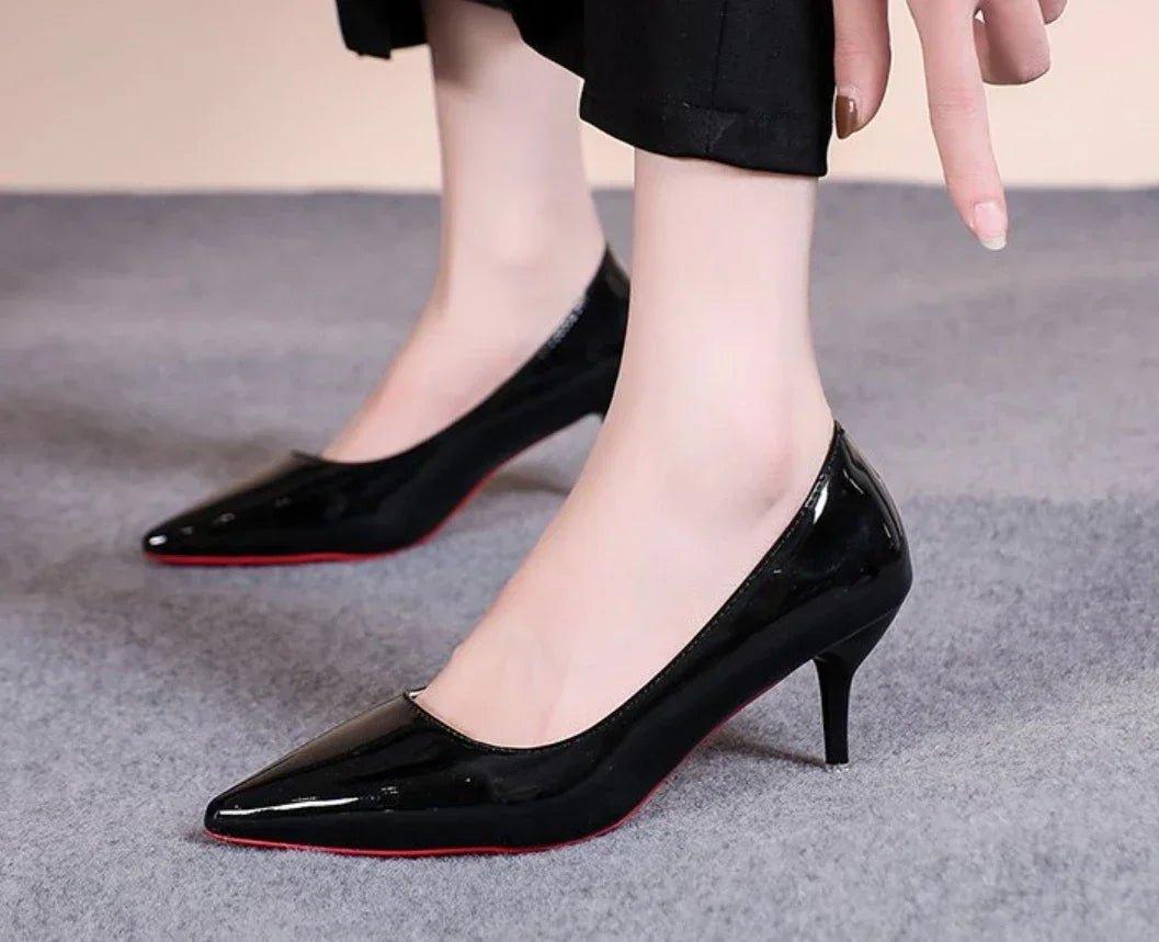 Black patent leather pointed toe heels with red soles, women's fashion footwear