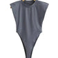 Gray sleeveless bodysuit with high-cut legs, women's fashion top on hanger
