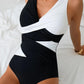Black and white one-piece swimsuit with wrap design, stylish beachwear for women