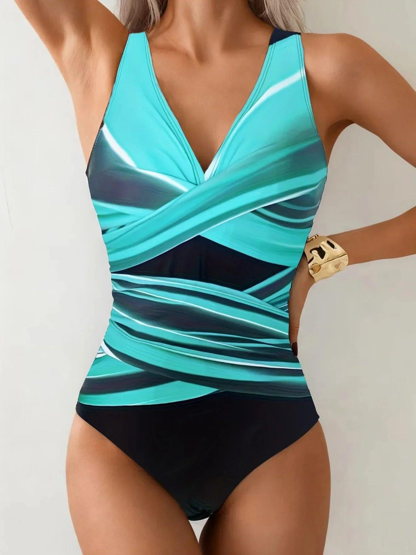 Women's turquoise and black one-piece swimsuit with crisscross front design, stylish beachwear fashion