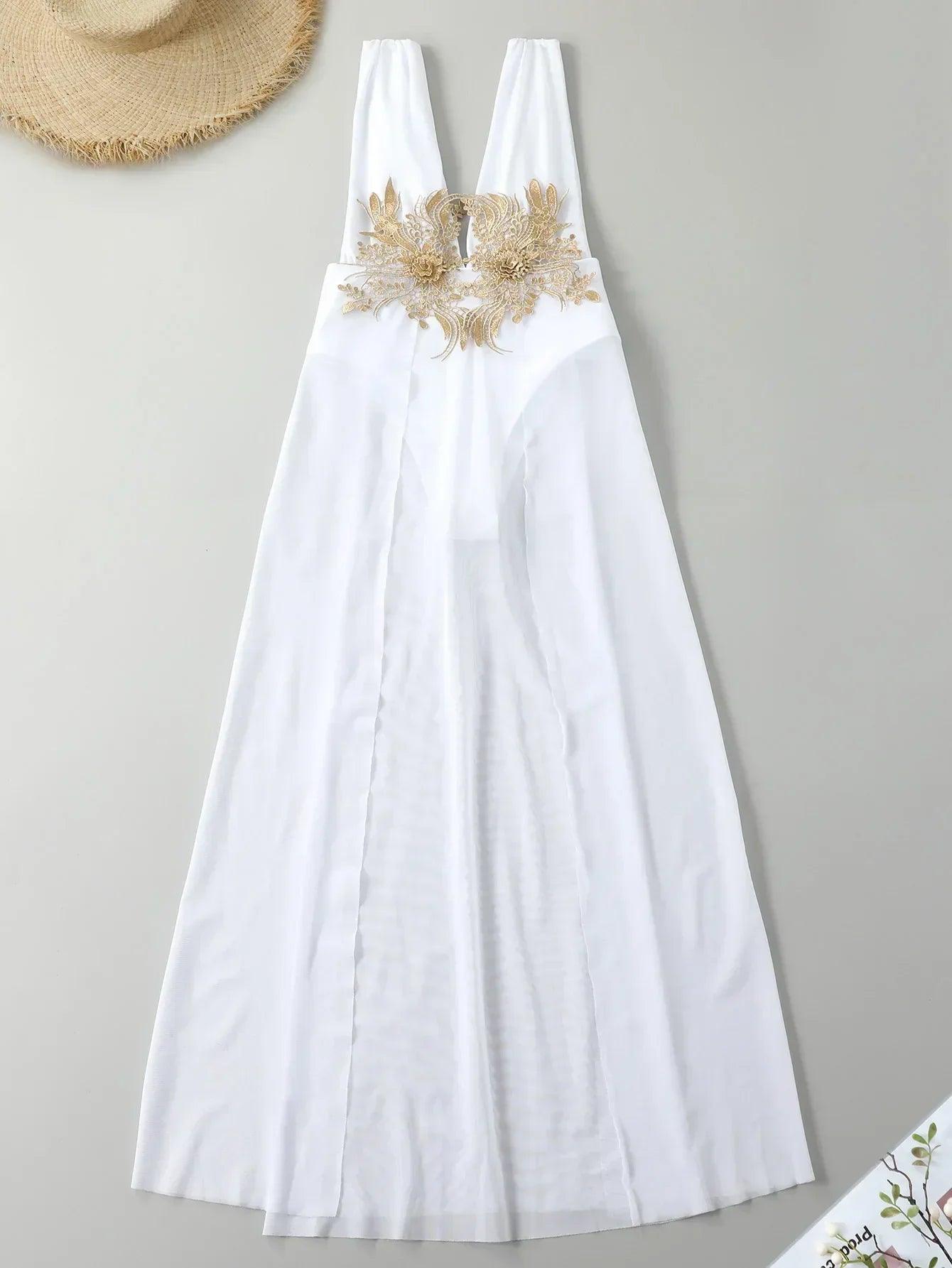White women's maxi dress with gold floral embroidery, beach fashion style