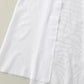White women's fashion dress fabric close-up, soft texture, clean hem detail