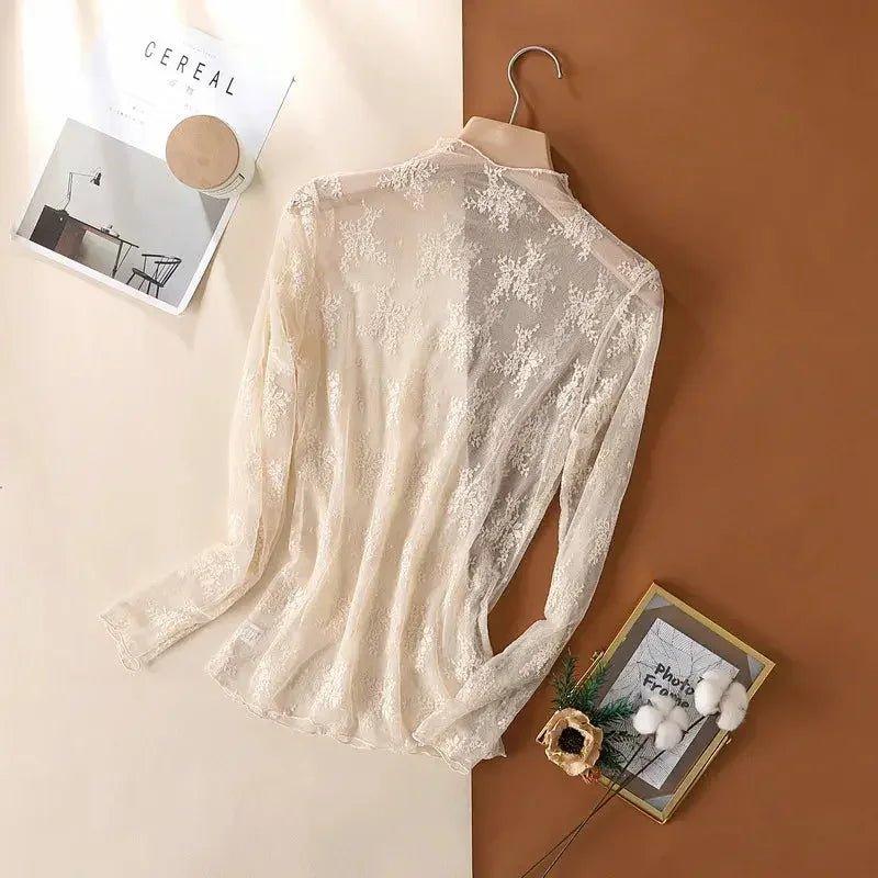 Elegant lace blouse with long sleeves, perfect for women's fashion and beauty styles